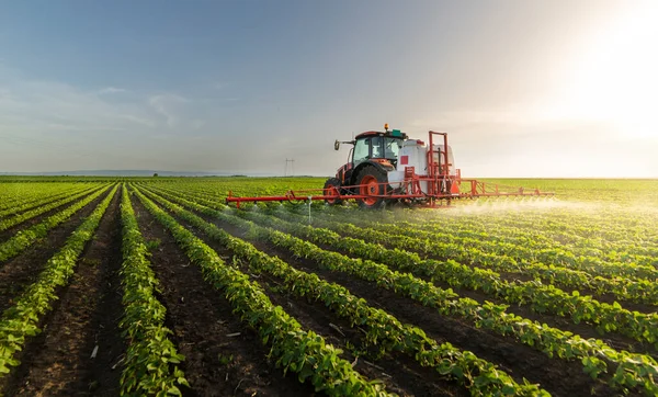 depositphotos_380529538-stock-photo-tractor-spraying-pesticides-soy-field